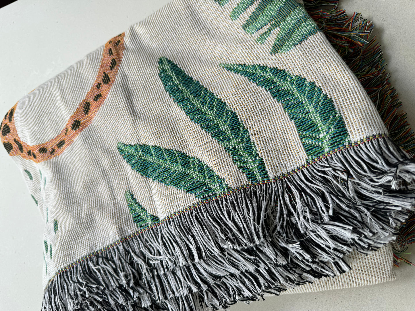 Woven jungle throw