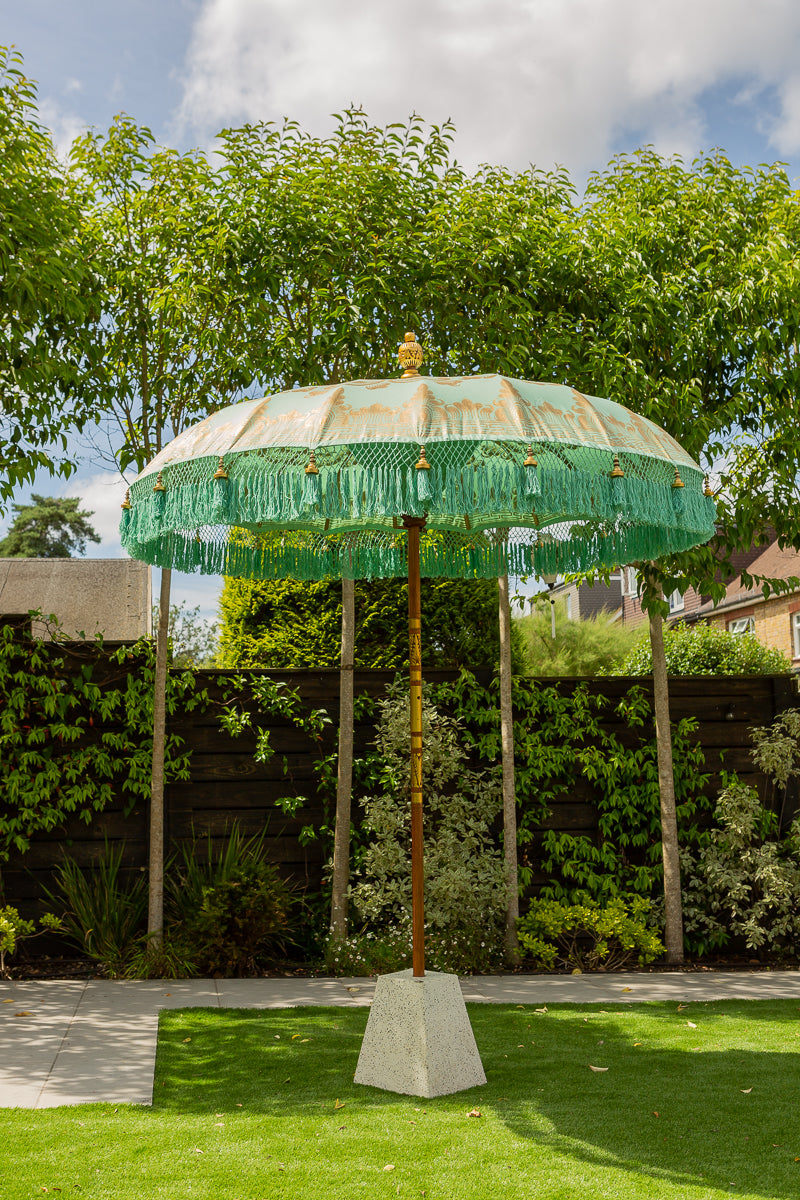 Mint green and gold fringed garden parasol