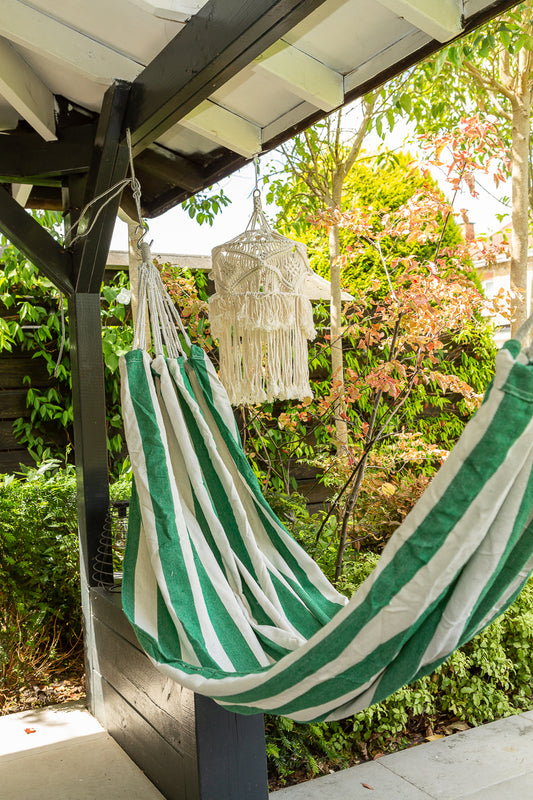 Green and white striped hammock