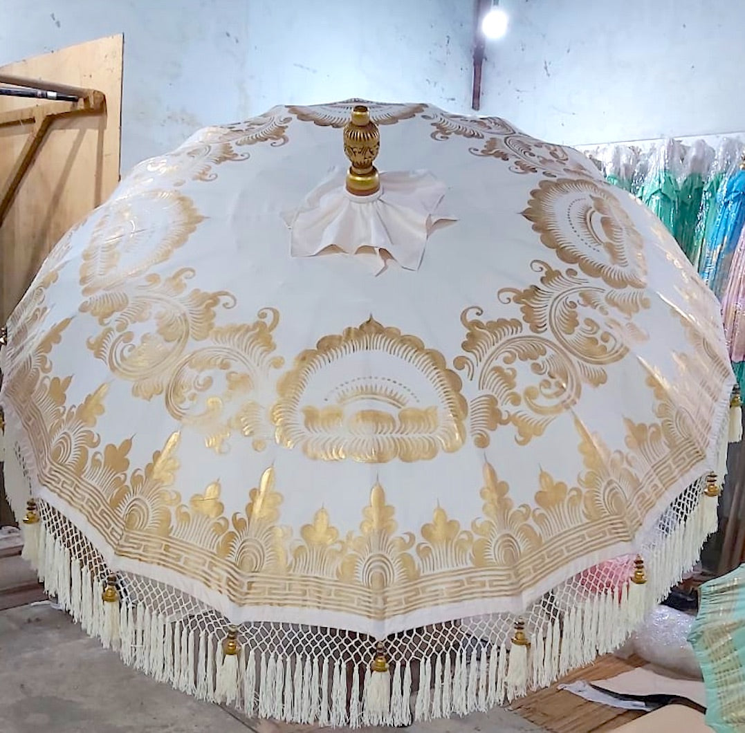 Ivory and gold fringed parasol